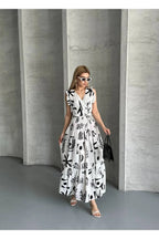 Pimu V-Neck Maxi Dress with Graphic Print-Black | Grocsy
