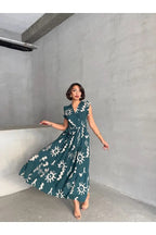 Pimu V-Neck Maxi Dress with Teal-Blue Graphic Print | Grocsy