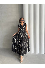 Pimu V-Neck Maxi Dress with Black Graphic Print | Grocsy