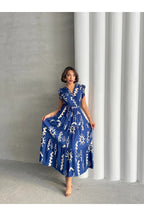 Pimu V-Neck Maxi Dress with Royal-Blue Graphic Print | Grocsy