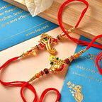 2 Ganesha Gajmukh Rakhi & Assorted Cashew | Grocsy
