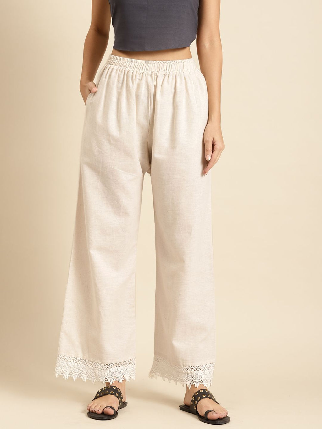 TAG 7 Women Off-White Solid Hem Design Straight Palazzos | Grocsy