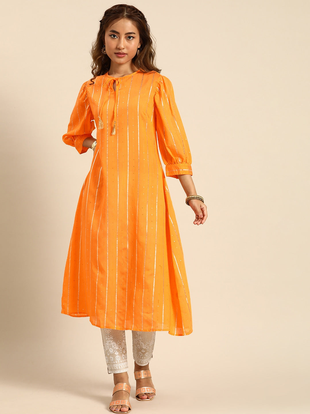 Sangria Women Jacquard Chanderi Silk Tie-Up Neck Puff Sleeves Kurta With Sequin Detail | Grocsy