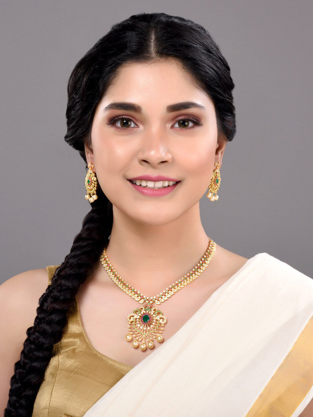 Saraf RS Jewellery Women Gold-Toned & Multi-Coloured CZ-Studded Handcrafted Jewellery Set | Grocsy