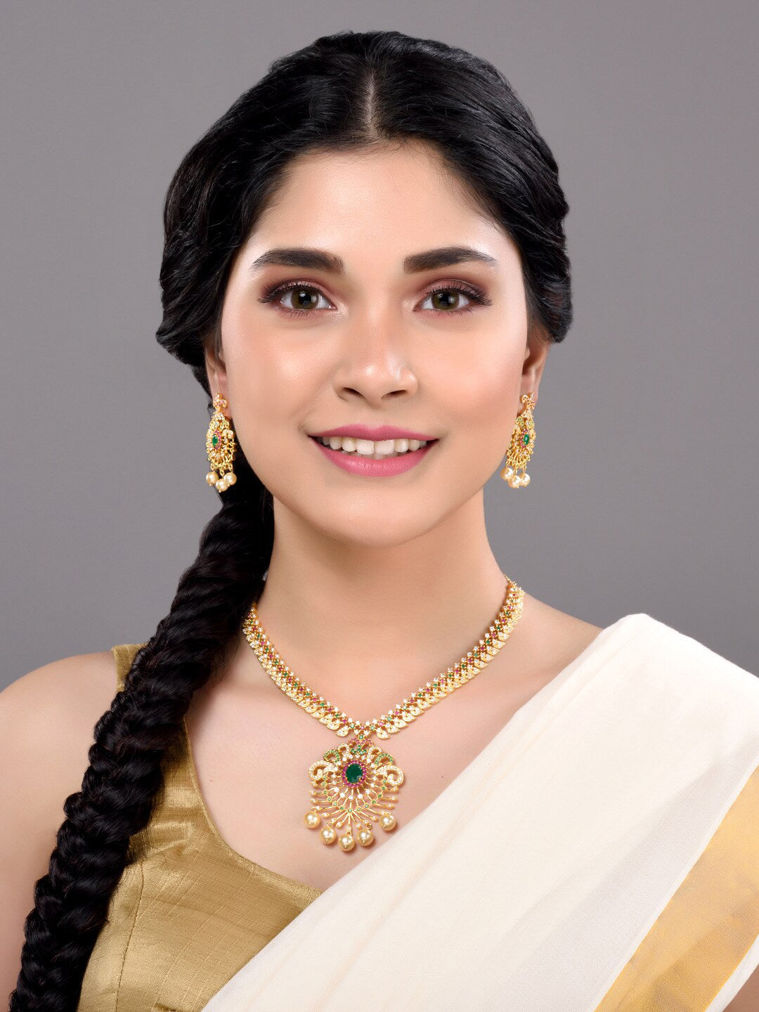 Saraf RS Jewellery Women Gold-Toned & Multi-Coloured CZ-Studded Handcrafted Jewellery Set | Grocsy