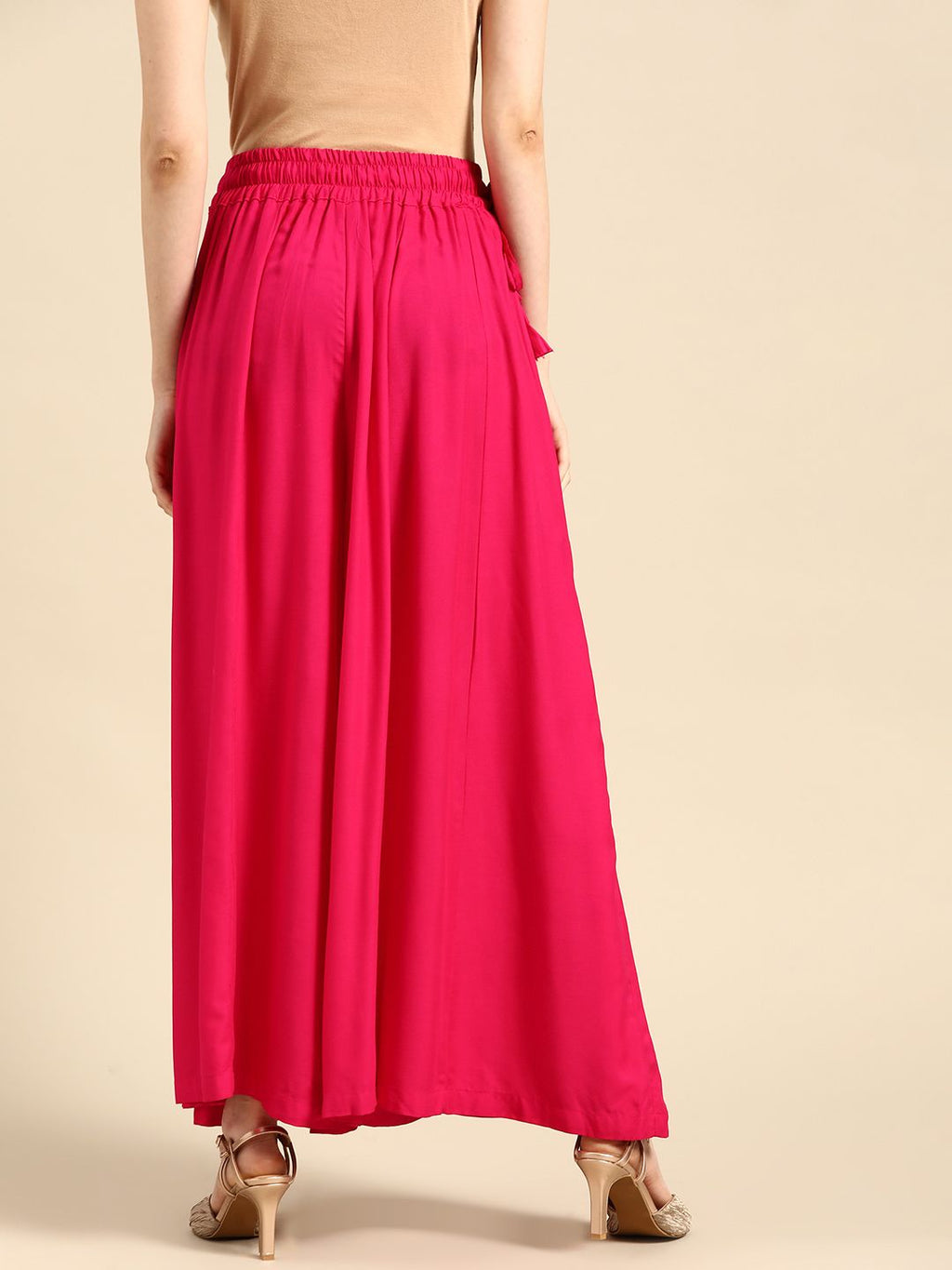 TAG 7 Women Magenta Solid Flared Palazzos | Grocsy