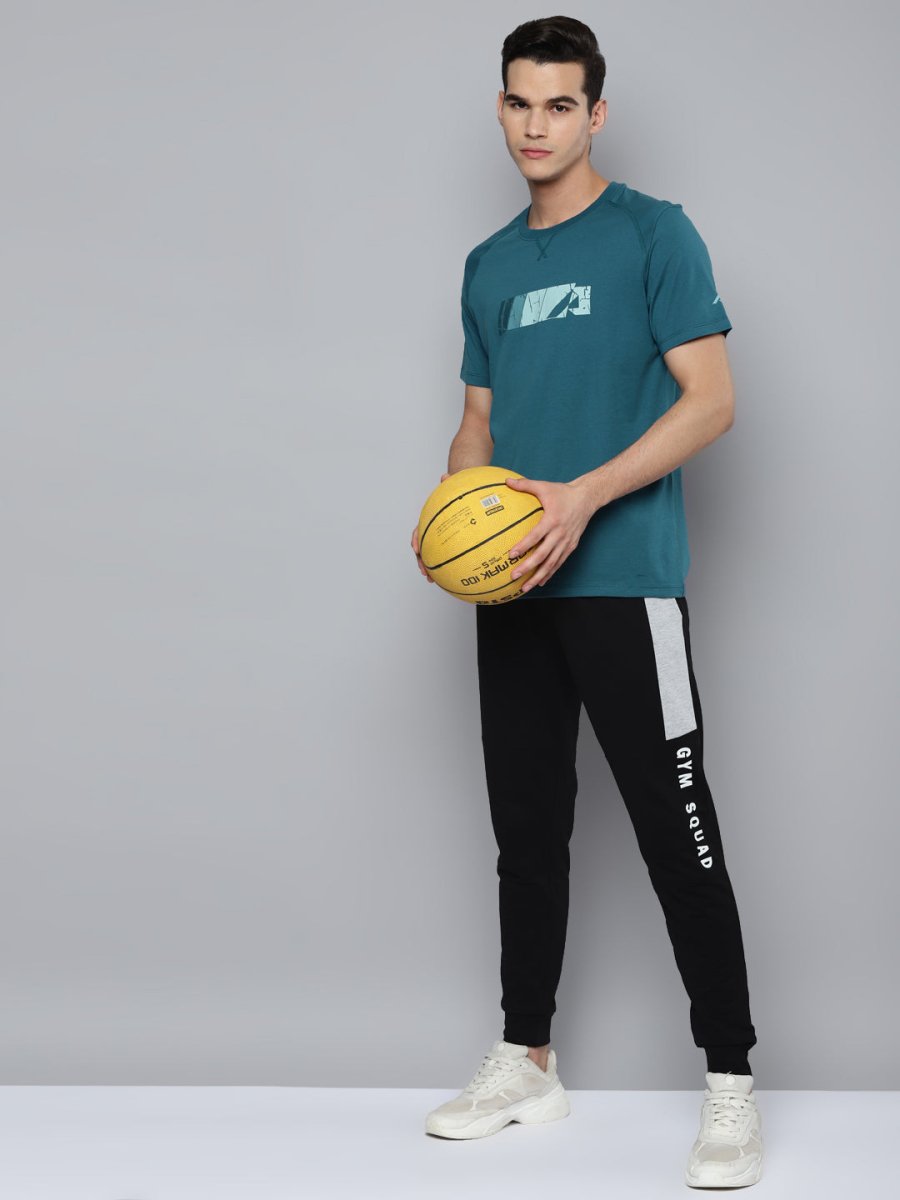Alcis Men Teal Printed Slim Fit Running T-shirt | Grocsy
