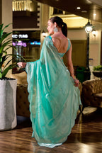 Vastranavya Turquoise Embroidery Work Shimmer Chiffon Saree with Unstitched Blouse | Grocsy