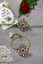NVR Women & Men Set of 2 Gold Kundan-Studded Handcrafted Wraparound Rakhi Set With Roli Chawal | Grocsy