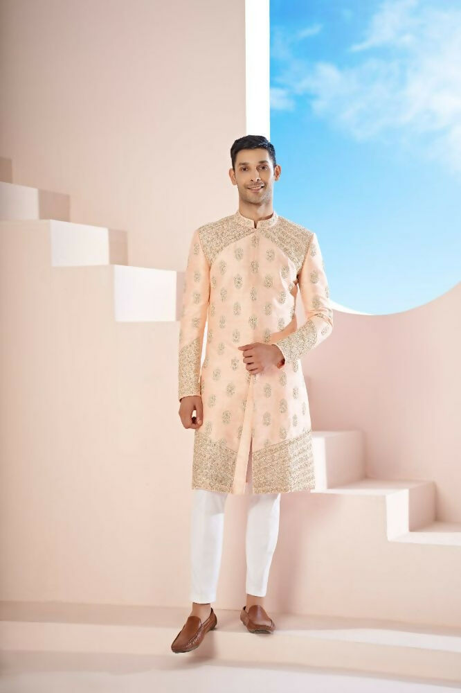 The Peach Sherwani Features Hexagonal Butas , V-Shaped Floral Jal Borders by Hilo Design | Grocsy