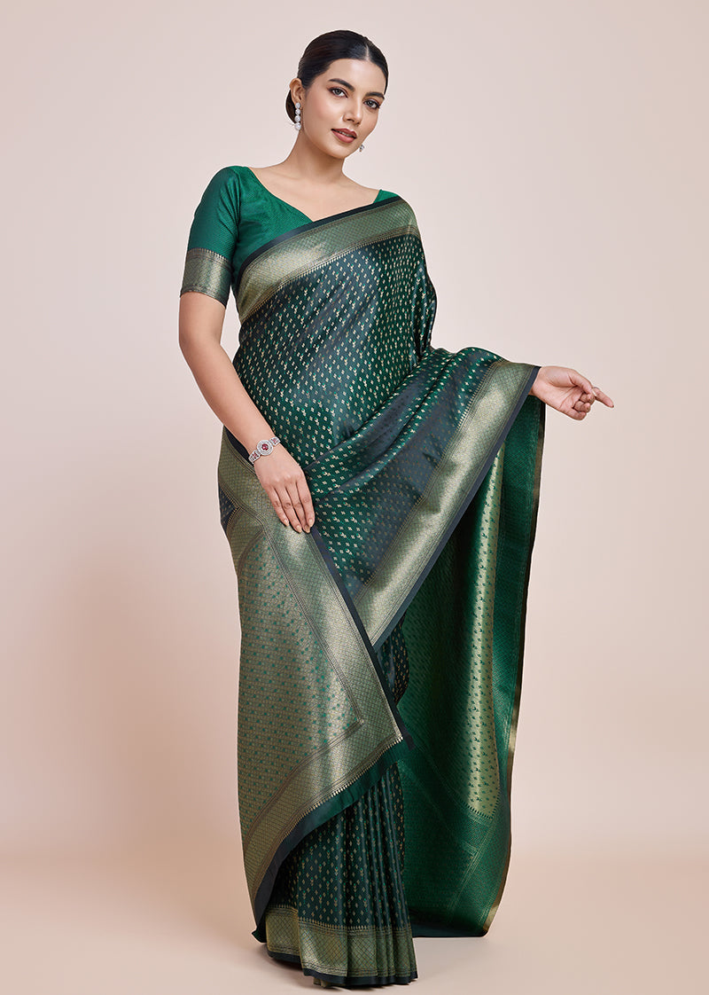 Monjolika Fashion Glamour And Tradition With This Zari Woven Dark Green Color Banarasi Satin Silk Saree | Grocsy