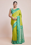 Monjolika Fashion Parrot Green Banarasi Silk In Satin Is Classy Embellished With Golden Zari Work Saree | Grocsy