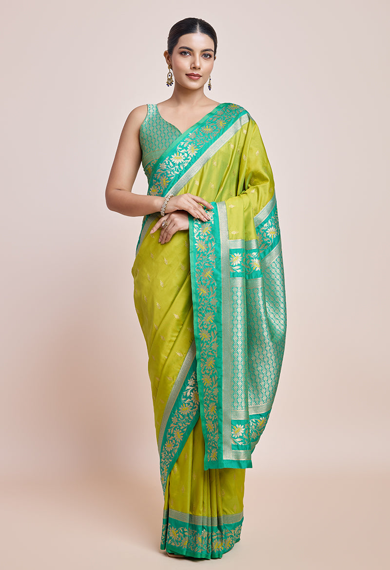 Monjolika Fashion Parrot Green Banarasi Silk In Satin Is Classy Embellished With Golden Zari Work Saree | Grocsy