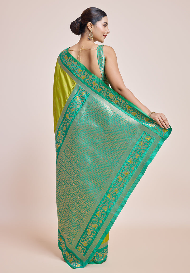 Monjolika Fashion Parrot Green Banarasi Silk In Satin Is Classy Embellished With Golden Zari Work Saree | Grocsy