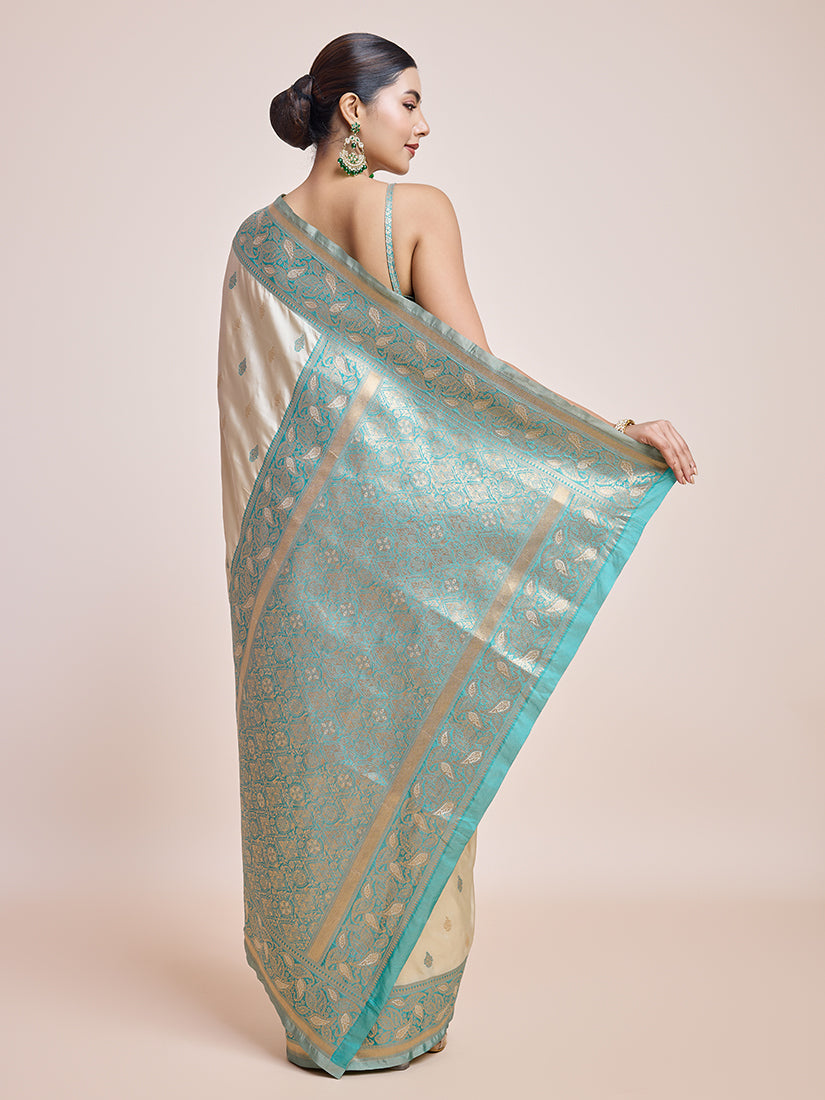 Monjolika Fashion Exquisite Designs With This Cream Banarasi Satin Silk Saree | Grocsy