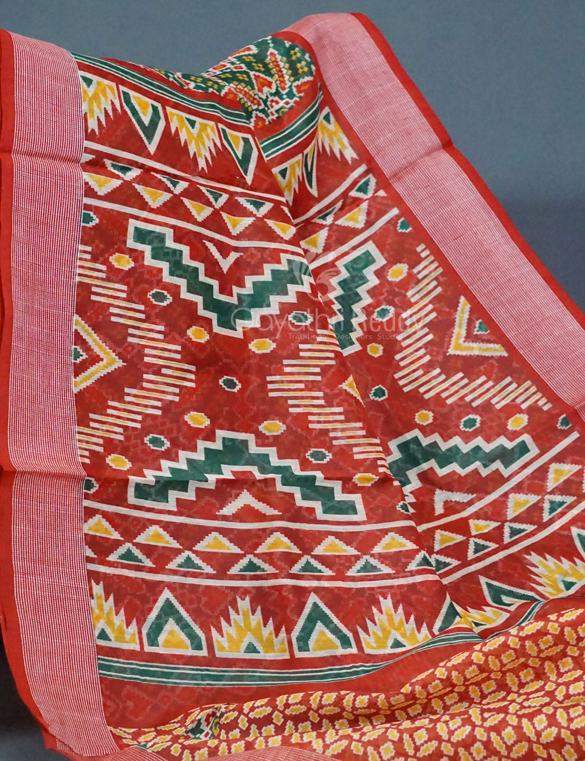 Shades of Navy Parrot Green Colour Patola Print Semi Chanderi Saree By Gayathri Reddy Designer Studio | Grocsy