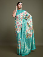 Monjolika Fashion Glamour And Tradition With This Zari Woven Turquoise And Cream Banarasi Silk Saree | Grocsy