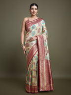 Monjolika Fashion Elegant Maroon And Cream Banarasi Silk SareeWith Intricate Zari Work | Grocsy