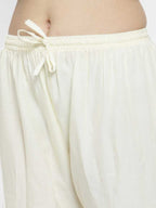 PAVONINE Off White Color Straight Fit Rayon Fabric Palazzo For Women | Grocsy