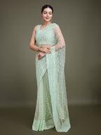 Monjolika Fashion Women'S Light Green Soft Net SareeWith Sequin Embellished Border And Pallu | Grocsy