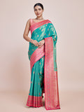 Monjolika Fashion Glamour And Tradition With This Zari Woven Banarasi Tissue Silk Turquoise Saree | Grocsy