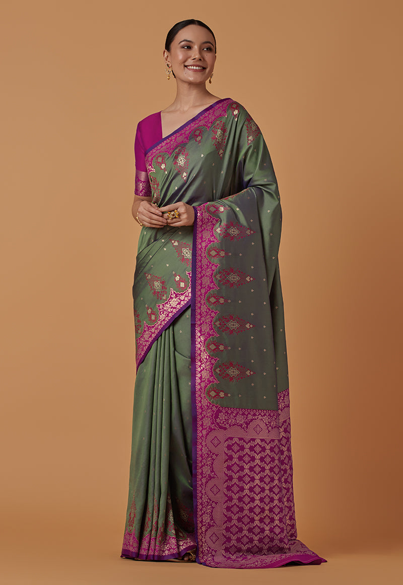 Monjolika Fashion Olive Banarasi Silk Blend SareeWith Zari Woven Rich Brocade Design | Grocsy