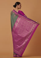 Monjolika Fashion Olive Banarasi Silk Blend SareeWith Zari Woven Rich Brocade Design | Grocsy