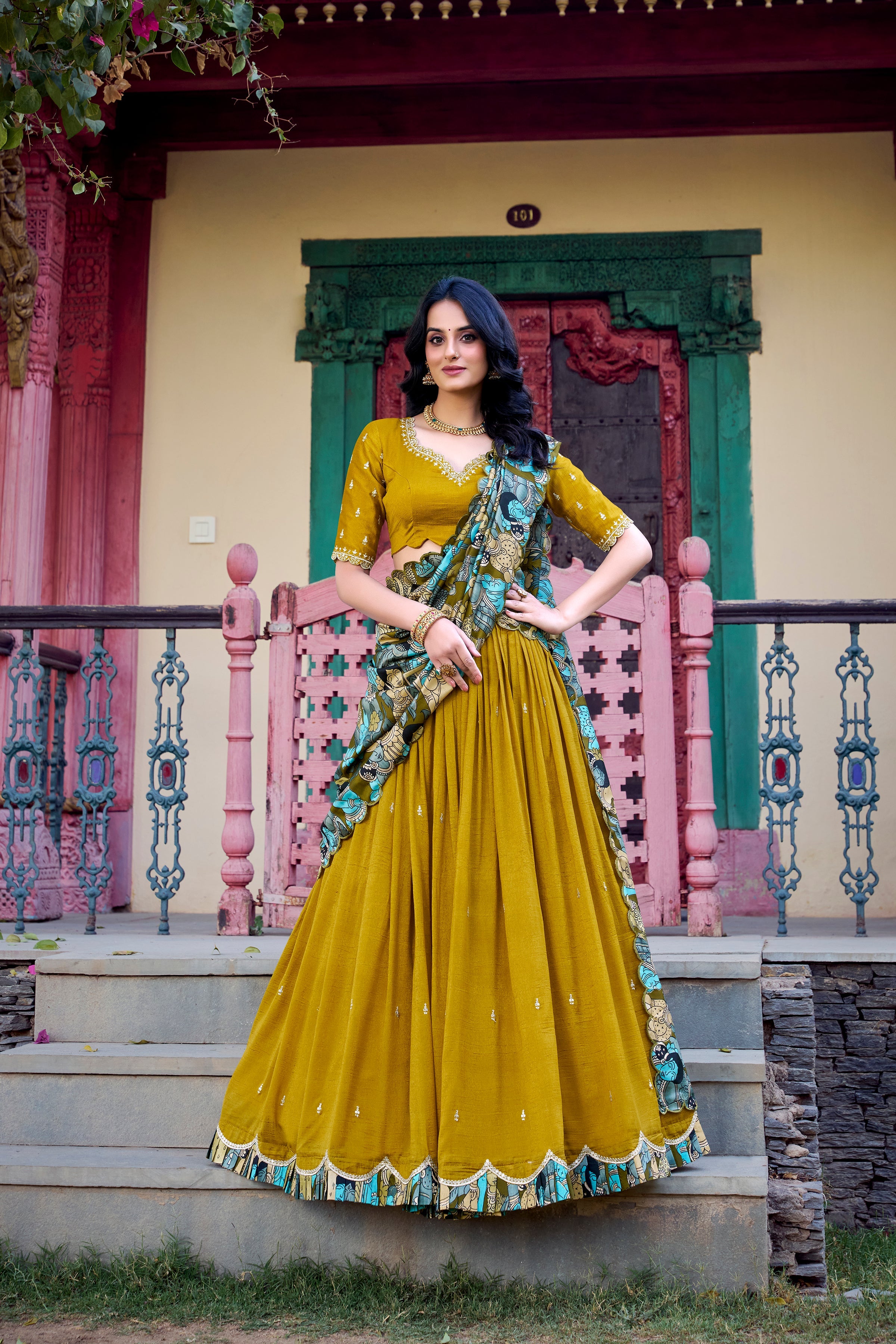 Lorenvalley Mustard Vichitra Silk Sequins and Thread Embroidery Work with Kalamkari Print Border Lehenga Choli with Dupatta | Grocsy