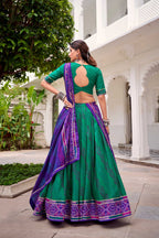 Evanik Green Tassa Silk With Bandhej Print Lehenga Choli | Grocsy