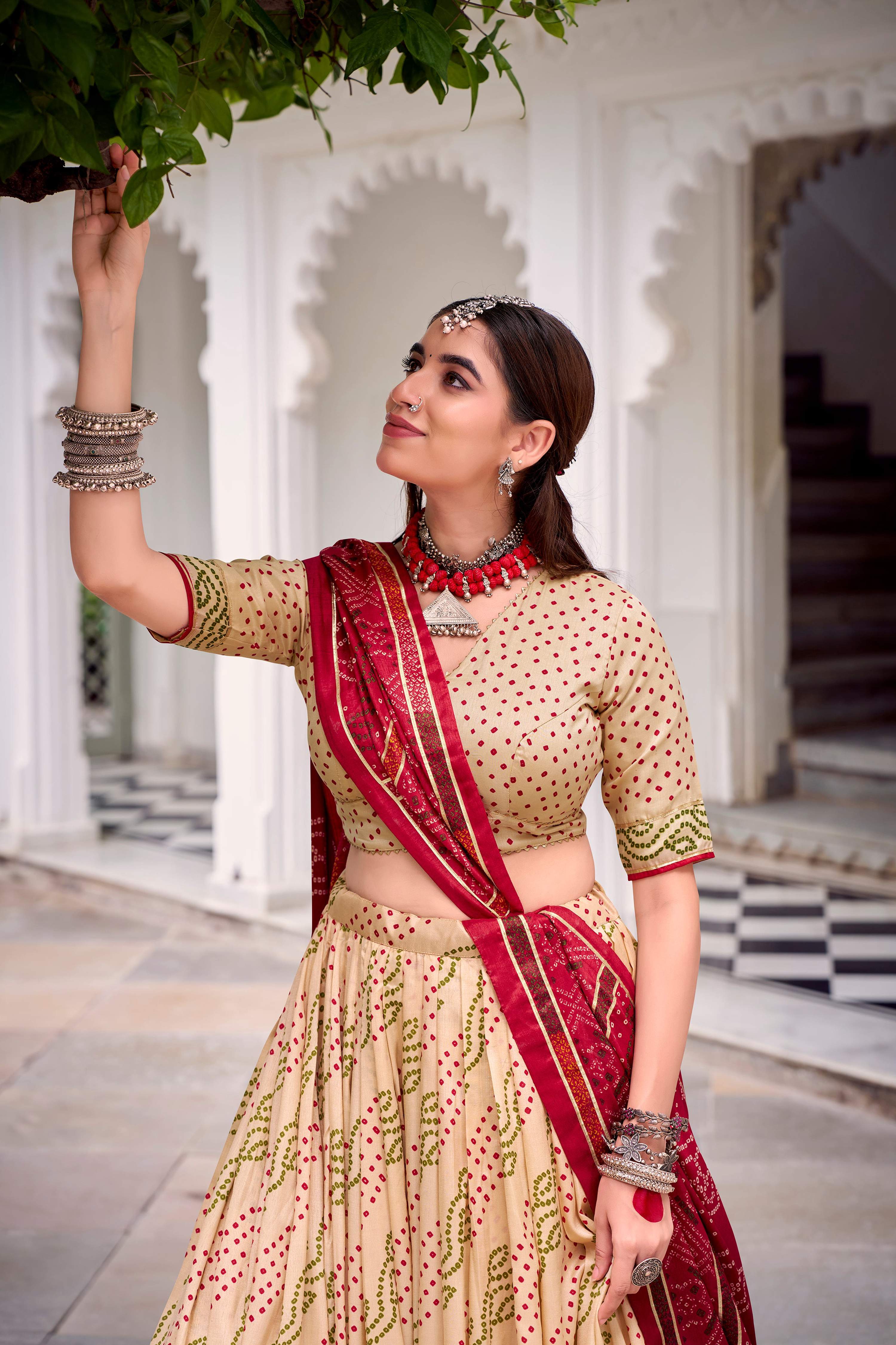 Evanik Offwhite Tassa Silk With Bandhej Print Lehenga Choli | Grocsy