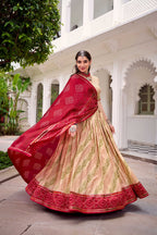 Evanik Offwhite Tassa Silk With Bandhej Print Lehenga Choli | Grocsy