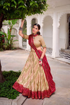 Evanik Offwhite Tassa Silk With Bandhej Print Lehenga Choli | Grocsy