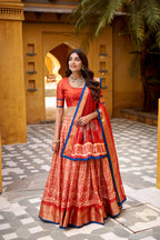 Lorenvalley Fashion Rust Dola Silk Batik Print with Zari Weaving Work Lehenga Choli with Dupatta | Grocsy