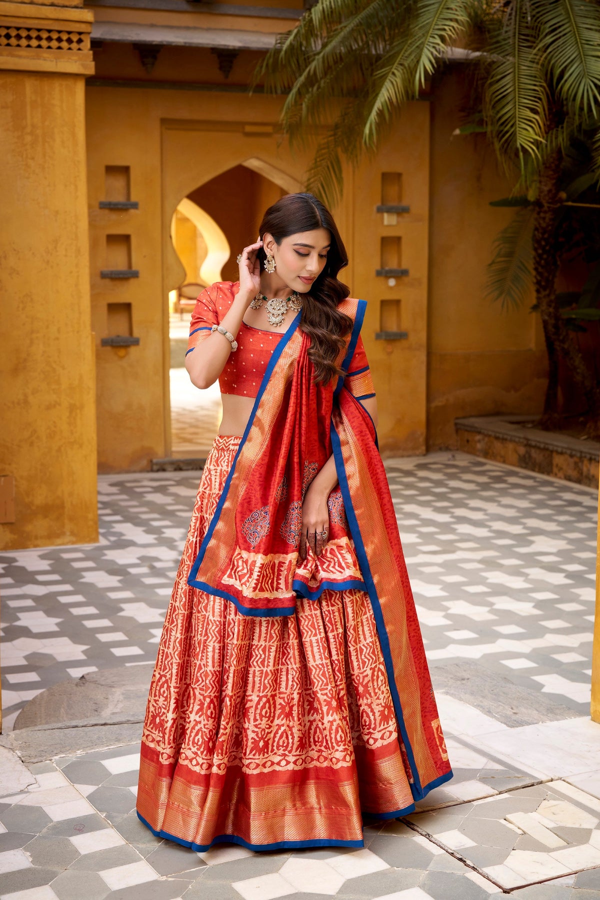 Lorenvalley Fashion Rust Dola Silk Batik Print with Zari Weaving Work Lehenga Choli with Dupatta | Grocsy