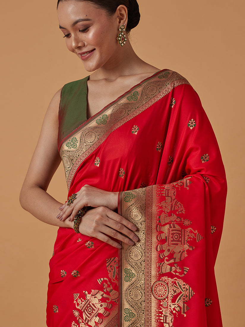 Monjolika Fashion Red Banarasi Silk Blend SareeWith Traditional & Modern Dulha Dulhan Figure Zari Woven Detailing | Grocsy