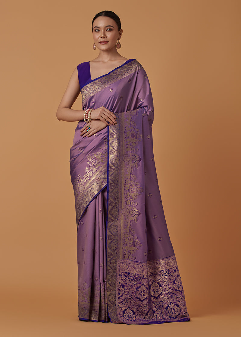 Monjolika Fashion Lavender Banarasi Silk Blend SareeWith Traditional & Modern Dulha Dulhan Figure Zari Woven Detailing | Grocsy