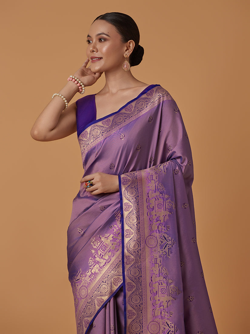 Monjolika Fashion Lavender Banarasi Silk Blend SareeWith Traditional & Modern Dulha Dulhan Figure Zari Woven Detailing | Grocsy