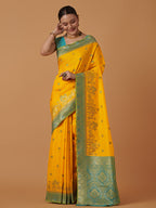 Monjolika Fashion Yellow Banarasi Silk Blend SareeWith Traditional & Modern Dulha Dulhan Figure Zari Woven Detailing | Grocsy