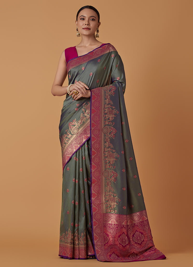 Monjolika Fashion Olive Banarasi Silk Blend SareeWith Traditional & Modern Dulha Dulhan Figure Zari Woven Detailing | Grocsy