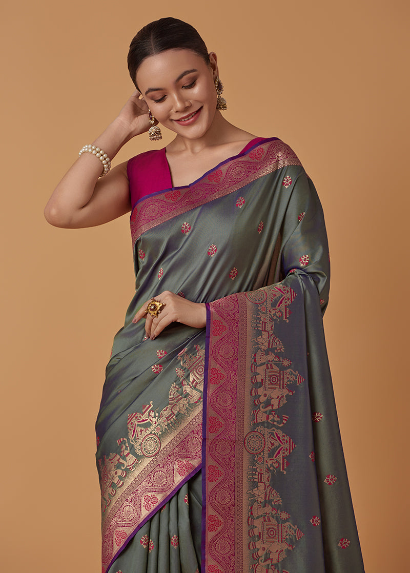 Monjolika Fashion Olive Banarasi Silk Blend SareeWith Traditional & Modern Dulha Dulhan Figure Zari Woven Detailing | Grocsy