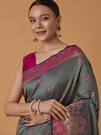 Monjolika Fashion Olive Banarasi Silk Blend SareeWith Traditional & Modern Dulha Dulhan Figure Zari Woven Detailing | Grocsy