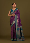 Monjolika Fashion Dark Purple Banarasi Silk Blend SareeIn Classic Paisley & Rich Zari Pallu Comes With Unstitched Blouse | Grocsy