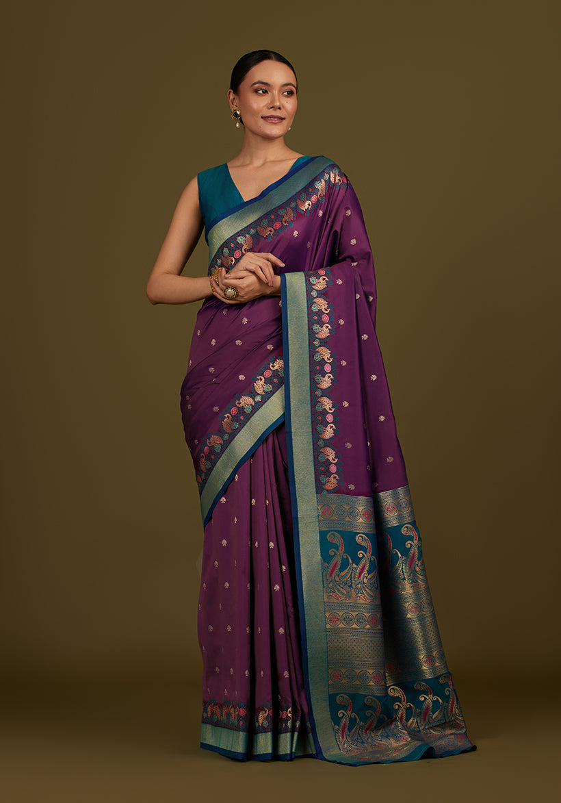 Monjolika Fashion Dark Purple Banarasi Silk Blend SareeIn Classic Paisley & Rich Zari Pallu Comes With Unstitched Blouse | Grocsy