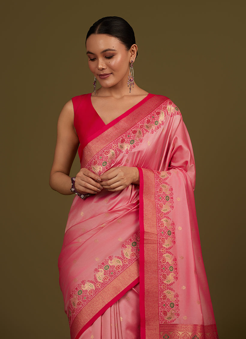 Monjolika Fashion Light Pink Banarasi Silk Blend SareeIn Classic Paisley & Rich Zari Pallu Comes With Unstitched Blouse | Grocsy