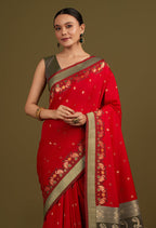 Monjolika Fashion Red Banarasi Silk Blend SareeIn Classic Paisley & Rich Zari Pallu Comes With Unstitched Blouse | Grocsy