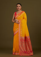 Monjolika Fashion Yellow Banarasi Silk Blend SareeIn Classic Paisley & Rich Zari Pallu Comes With Unstitched Blouse | Grocsy