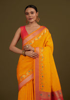 Monjolika Fashion Yellow Banarasi Silk Blend SareeIn Classic Paisley & Rich Zari Pallu Comes With Unstitched Blouse | Grocsy