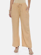 Souchii Beige Solid Flared Palazzos | Grocsy