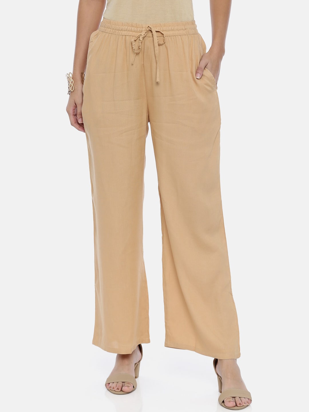 Souchii Beige Solid Flared Palazzos | Grocsy