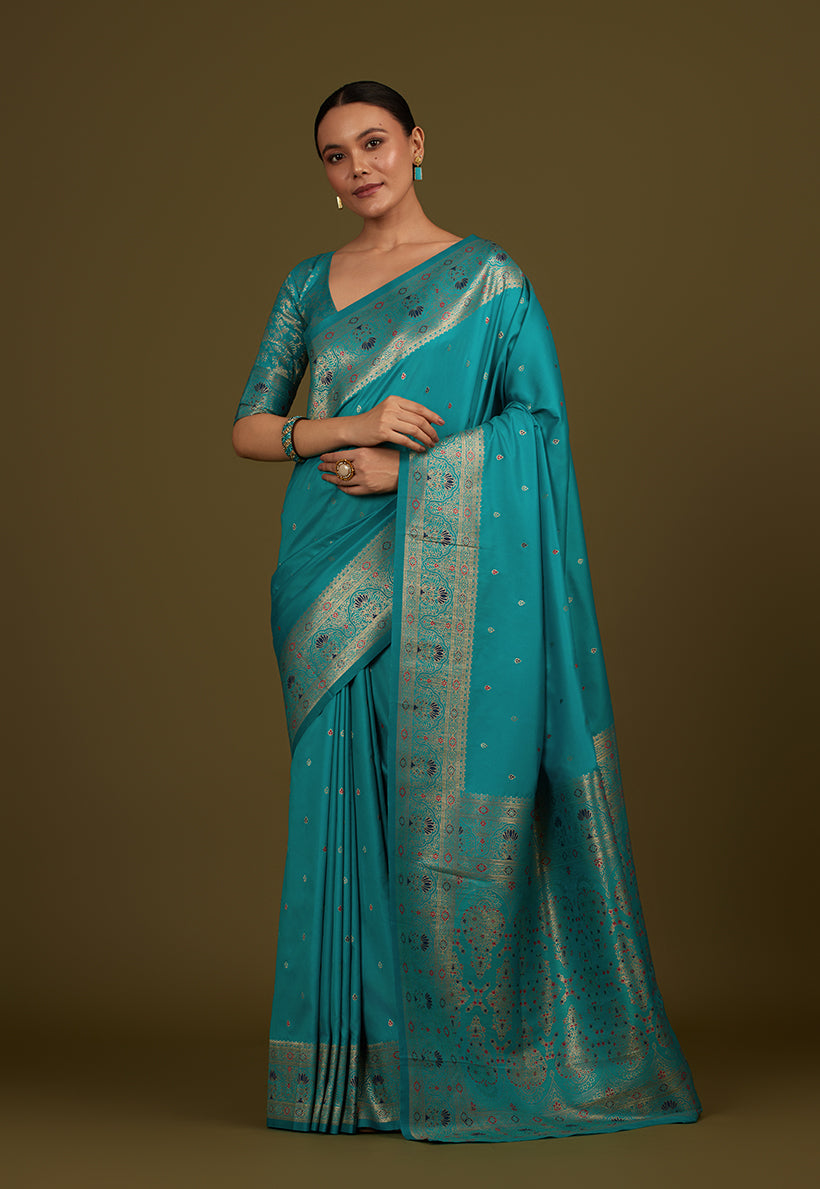 Monjolika Fashion Elegant Cyan Banarasi Silk Blend SareeBrocade Motifs & Zari Woven Splendor | Grocsy